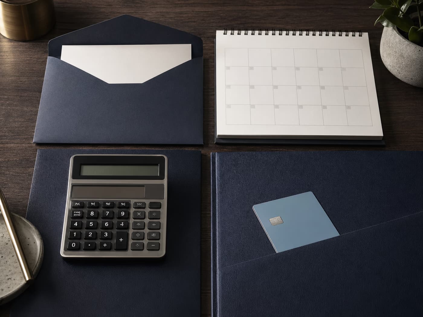 A premium desk still life representing lump-sum payments, calendar timing, calculators, and payment tools.