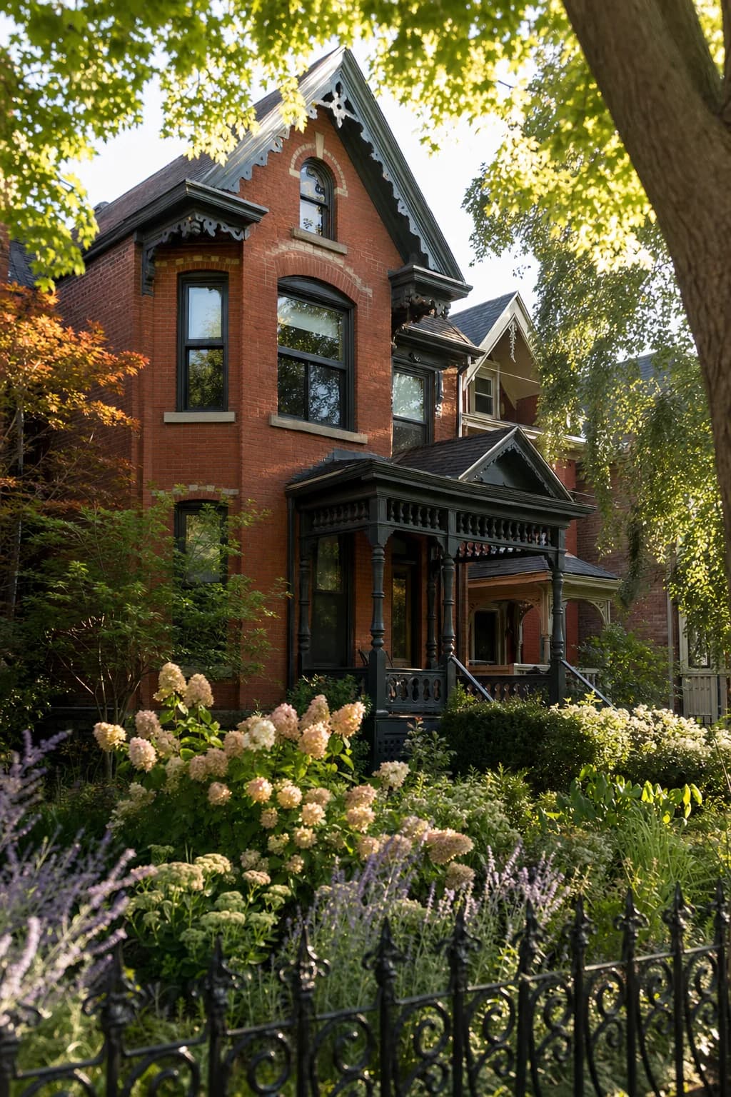 Victorian brick home with perennial garden in an old Toronto neighborhood
