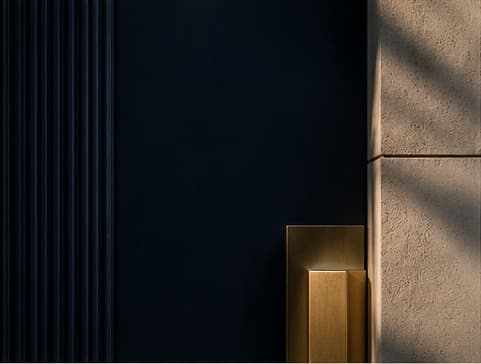 Dark navy and brass architectural detail suggesting capital clarity and exit discipline.